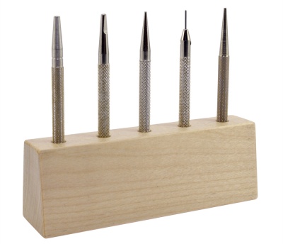 Set of Punching Tools on a Wood Stand